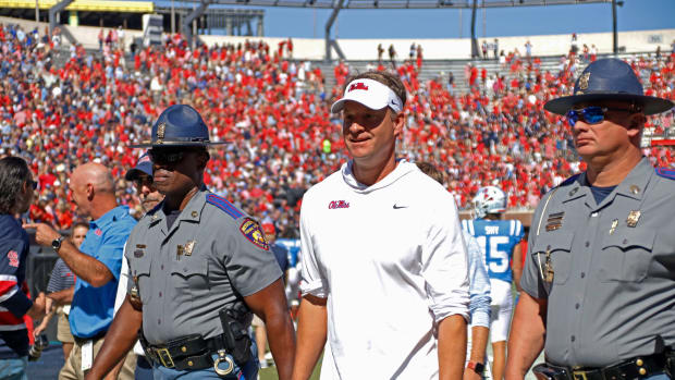 Lane Kiffin smiling
